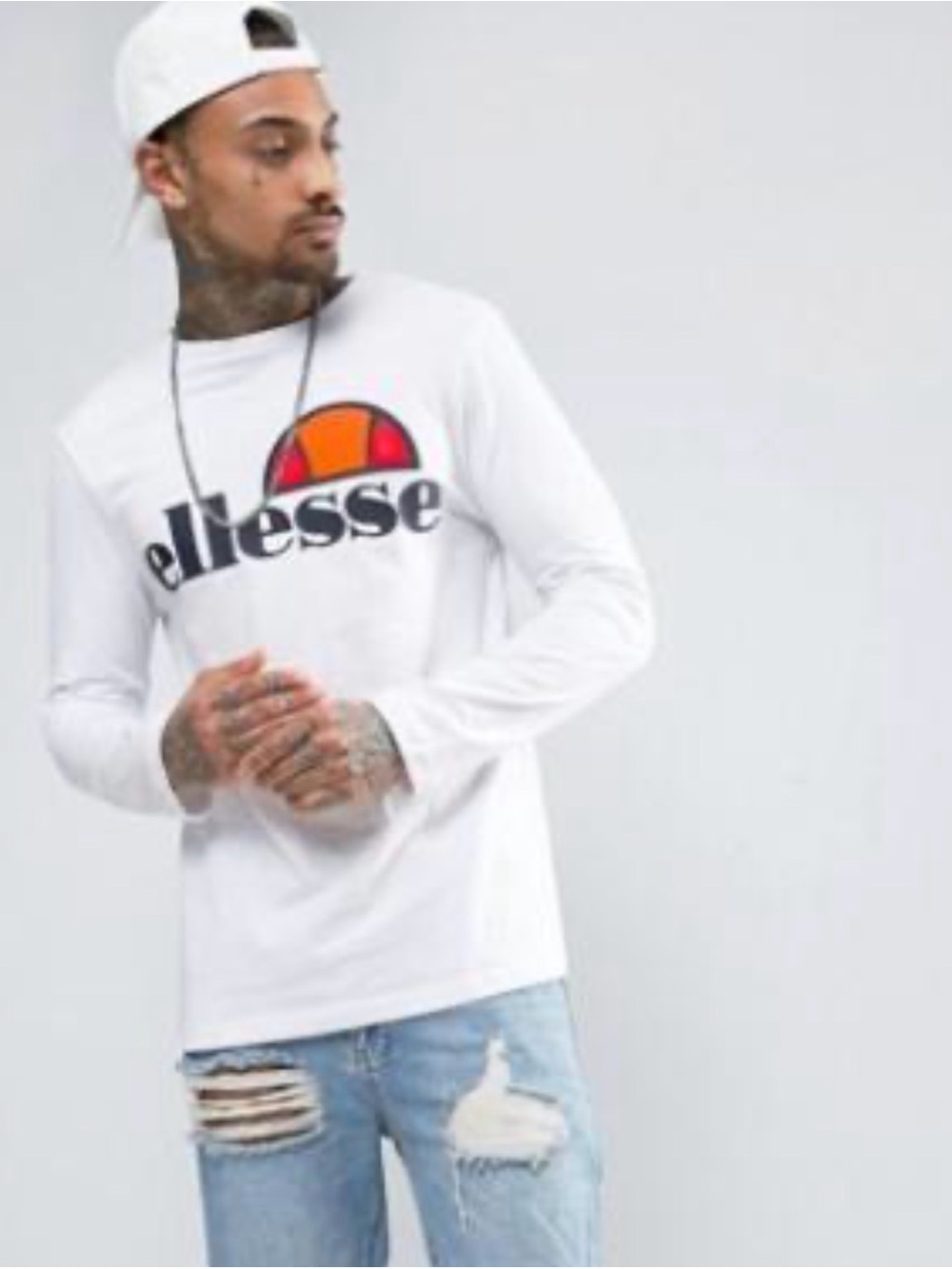 ellesse White Long Sleeve Logo Tee with Orange & Red Emblem